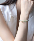 The Uniti - สร้อยข้อมือปลุกเสก บ่วงนาคบาศ อัญมณีหยกพม่ามงคล - The Samsara Series - Harmenstone Thailand